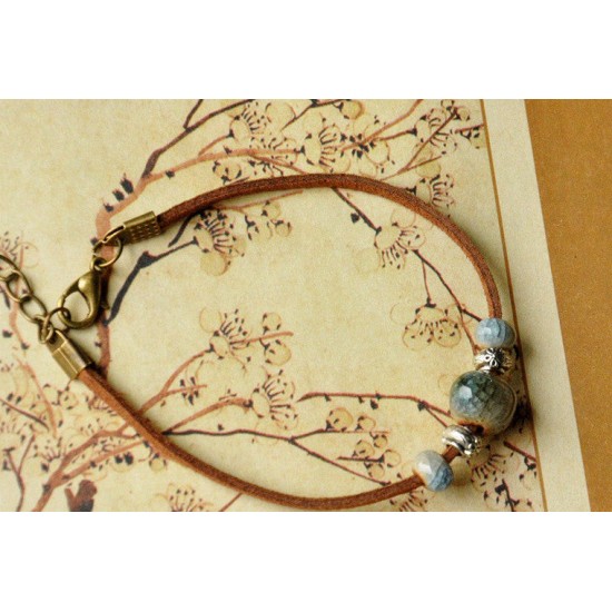 flower charm and ceramic bead leather bracelet